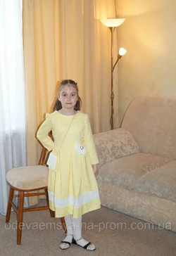Шикарное платье для девочки желтое